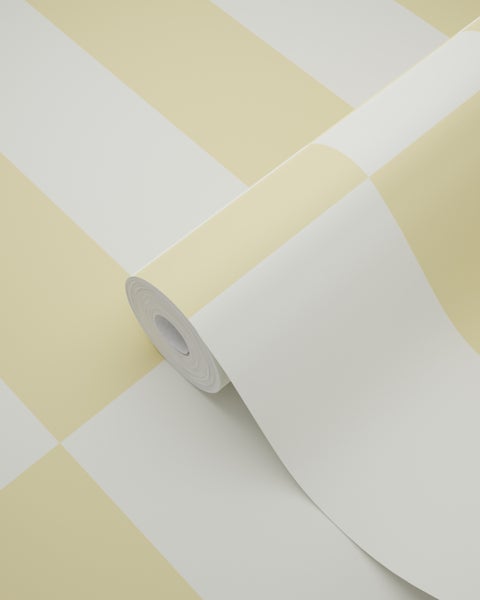 Tapetenrolle mit großflächigem Karomuster in Gelb und Weiß.