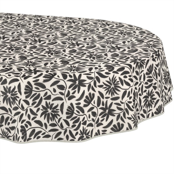 Ovale Tischdecke mit Blumenmuster und Blättern.