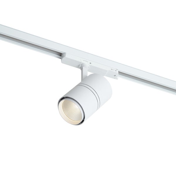 Weißer Schienensystem-Strahler mit zylindrischem Kopf für Innenräume an einer Stromschiene.