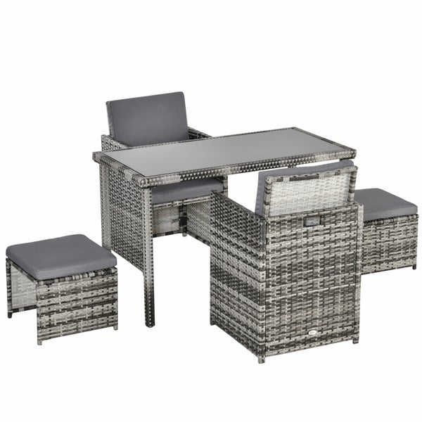 Balkonset aus grauem Polyrattan, Tisch mit Glasplatte, zwei Sessel und zwei Hocker inklusive Auflagen.