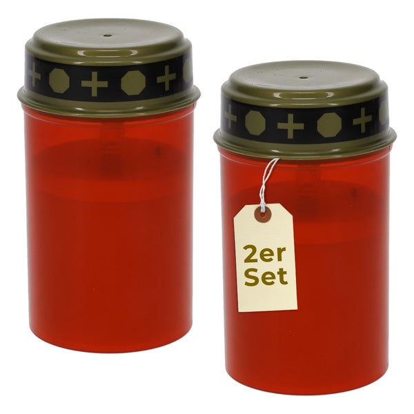 Zweier-Set rote Grablichter mit verzierten goldfarbenen Deckeln.