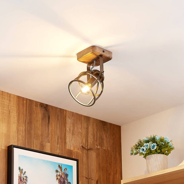 Wandleuchte im Industriedesign mit Käfigschirm und Holzelement