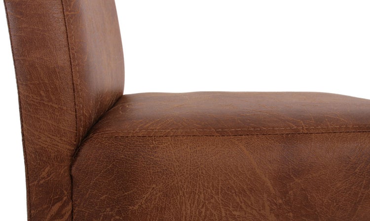 Detailaufnahme eines Stuhls mit Sitz und Rückenlehne aus Kunstleder