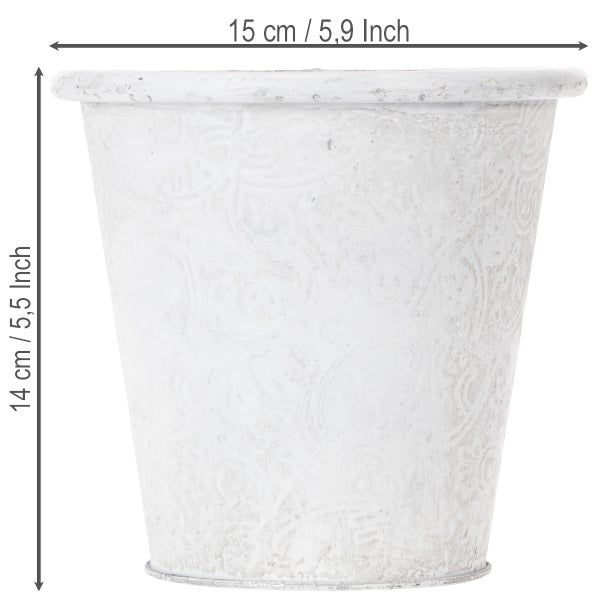 Weißer Übertopf mit Reliefmuster, Durchmesser 15 Zentimeter, Höhe 14 Zentimeter.