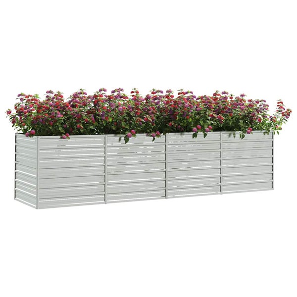 Rechteckiges Hochbeet aus Metall mit horizontaler Lamellenstruktur bepflanzt mit blühenden Blumen