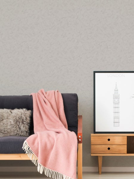 Wohnraum mit grauer Vliestapete mit Struktur