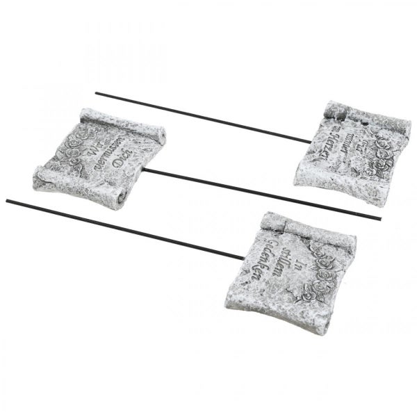 Grabschmuck mit Trauerspruch, ein dekoratives Element für Friedhof und Gedenkstätte