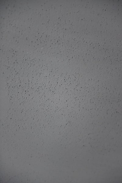 Rechteckiger Pflanztrog aus glasfaserverstärktem Kunststoff in Beton-Optik.