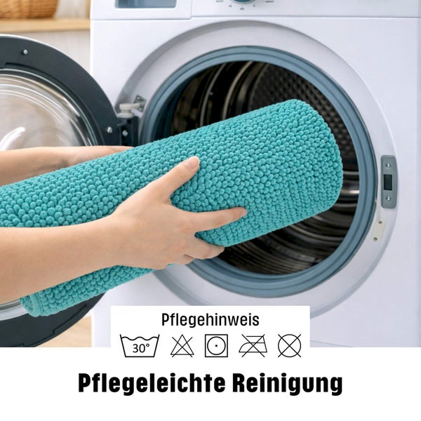 Badematte in Waschmaschine mit Pflegehinweisen: 30 Grad Wäsche, nicht bleichen, trocknergeeignet, nicht bügeln, nicht chemisch reinigen.