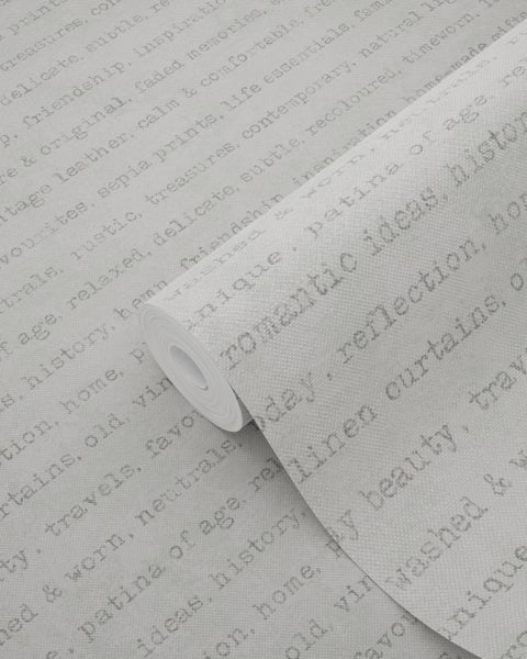 Tapetenrolle mit Textmuster