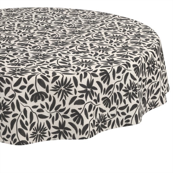 Runde Tischdecke mit schwarzem floralem Muster aus Blumen und Blättern.