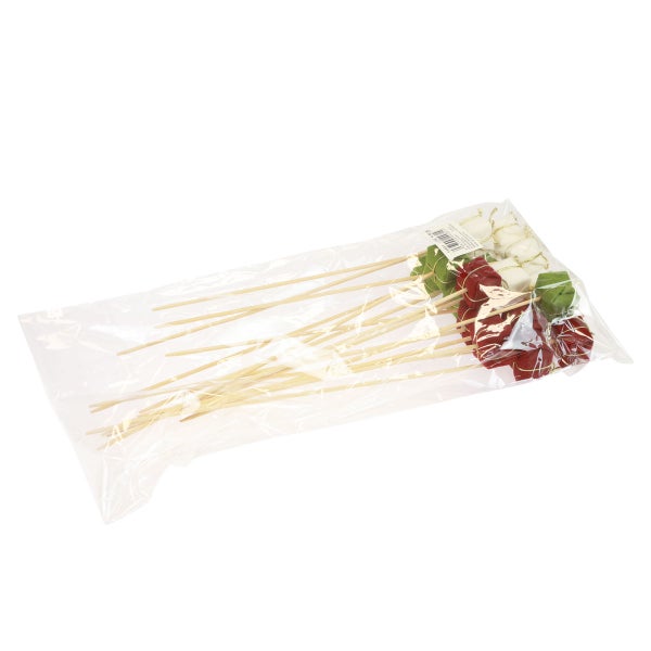 Dekospieße mit Dekoration in einer Verpackung