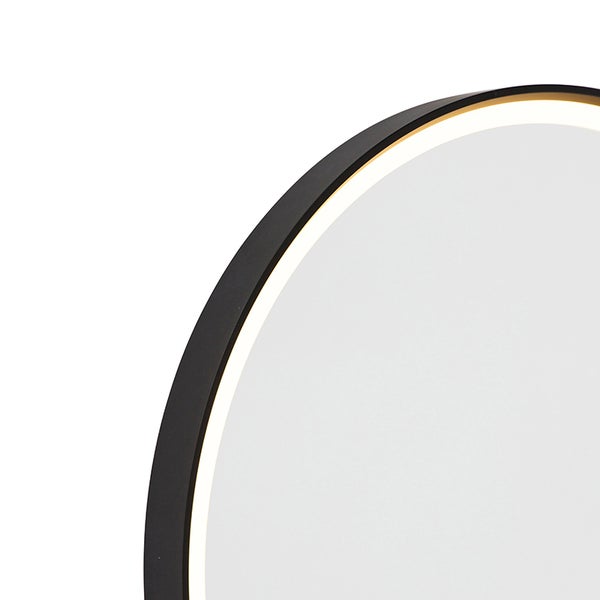 Detailaufnahme eines runden Spiegels mit Beleuchtung