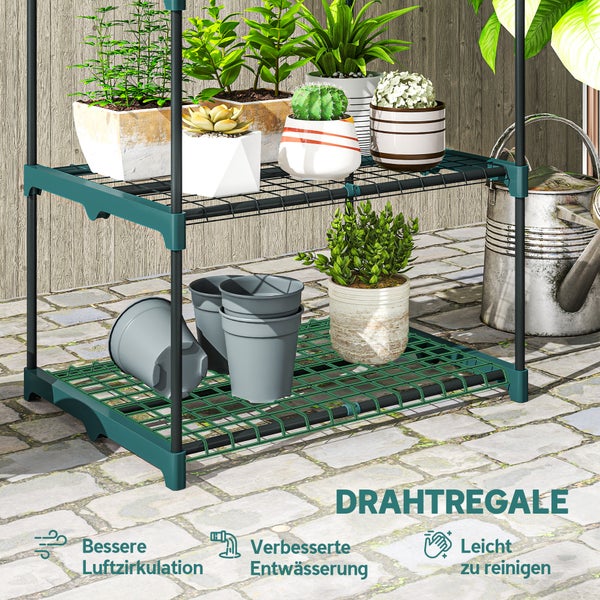 Zweistöckiges grünes Drahtregal für Pflanzen auf einer Terrasse, bietet gute Luftzirkulation und Entwässerung.