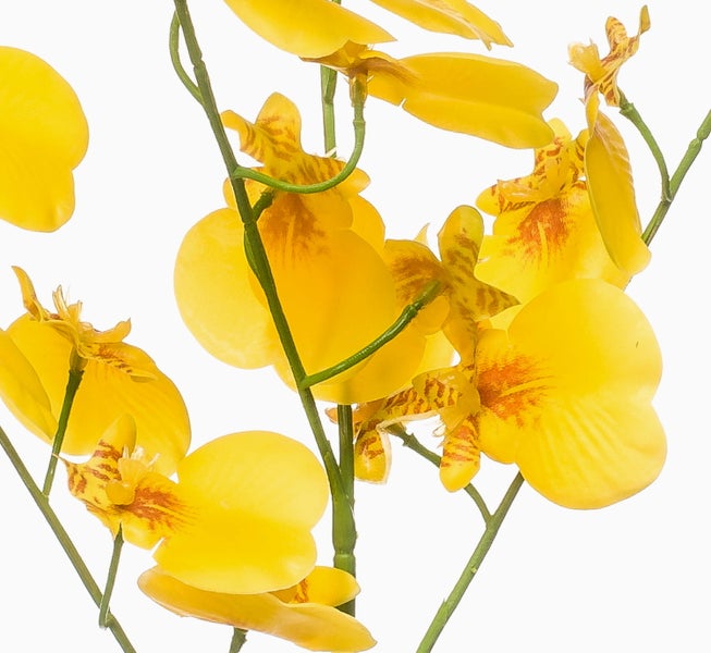 Künstliche Orchidee als Zweig mit gelben Blüten und grünem Stiel.