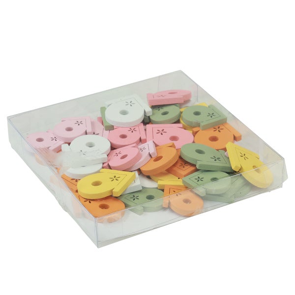 Dekorative Holzstreuteile in einer transparenten Box.