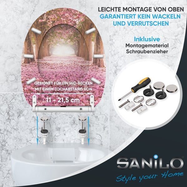 SANILO WC-Sitz mit Kirschblüten-Motiv, inklusive Montagematerial. Montage von oben, verstellbarer Lochabstand 11 bis 21,5 Zentimeter. Sanilo Logo.