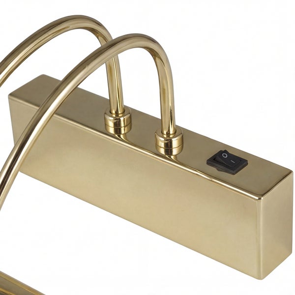 Detailaufnahme einer Bilderleuchte mit Schalter