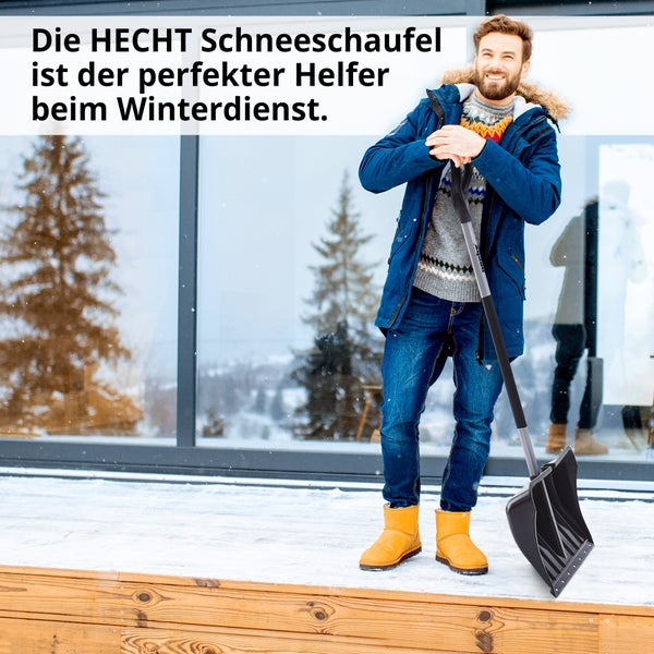 Mann mit HECHT Schneeschaufel für den Winterdienst vor einem Haus