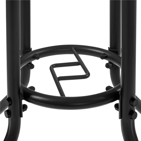 Detailaufnahme eines schwarzen Möbeluntergestells aus Metall mit kreisförmiger Verstrebung.