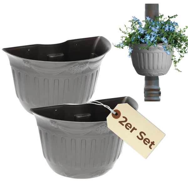 Zwei Wandblumentöpfe im Set mit einem Beispiel für eine Wandbefestigung mit Blumen.