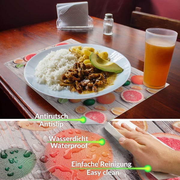 Rutschfestes, wasserdichtes Platzset mit Zitrusfrüchte-Motiv auf Holztisch, zeigt einfache Reinigung und einen Teller mit Essen.