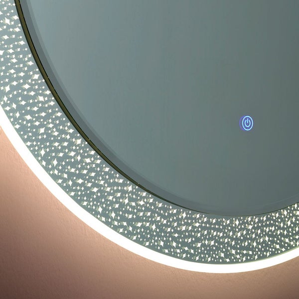 Runder Badezimmerspiegel mit LED-Beleuchtung im Sternendesign und integriertem Touch-Schalter.