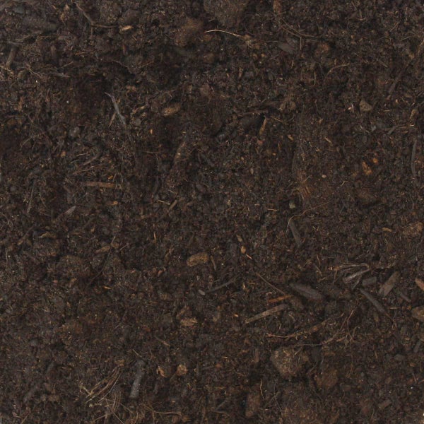 Blumenerde mit grober Struktur und organischen Bestandteilen wie Rinde und Fasern.
