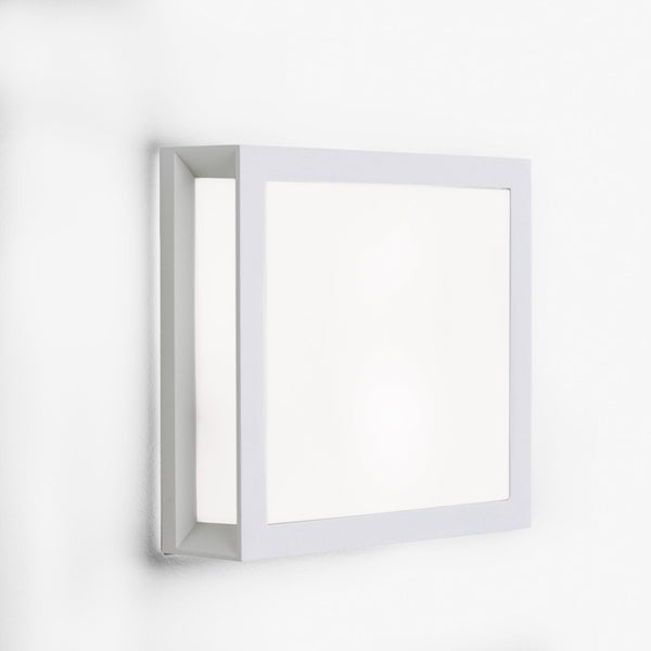Quadratische LED-Wandleuchte mit weißem Rahmen.