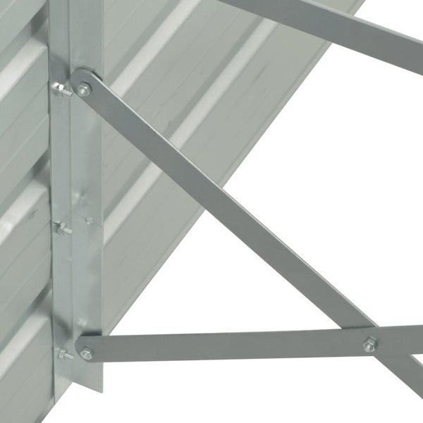 Detailansicht der Metallverstrebung und Verschraubung an einer Gartenhauswand aus Metall.