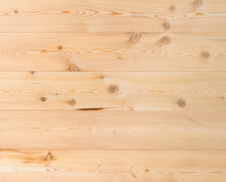 Textur von hellen Holzbohlen mit sichtbarer Holzmaserung und Ästen.