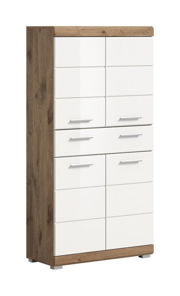 Hoher Schrank mit Korpus in Eichenoptik und weißen Hochglanz-Fronten mit silbernen Griffen.
