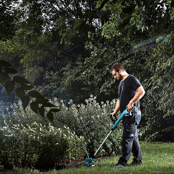 Makita DUR181T Akku-Rasentrimmer 18 V / 1x 5,0 Ah Akku