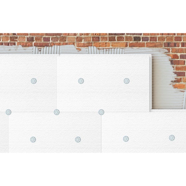 Wärmedämmplatten an einer Ziegelwand befestigt