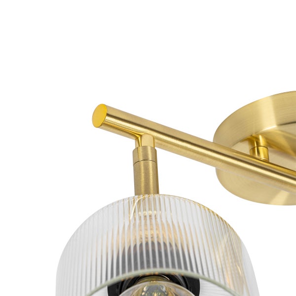 Wandleuchte mit transparentem, geripptem Lampenschirm