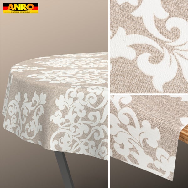 Abwaschbare runde Tischdecke mit floralem Damastmuster, ANRO Logo. Die Detailansicht zeigt die strukturierte Materialoberfläche.