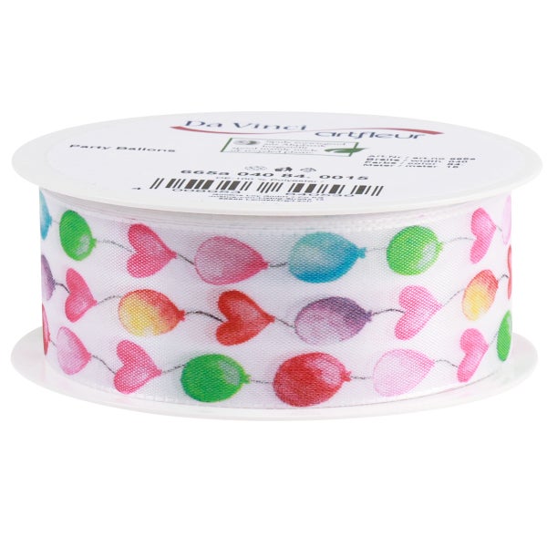 Dekoratives Geschenkband mit aufgedruckten Ballons auf einer Spule.