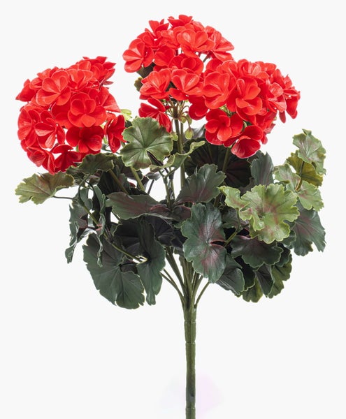 Künstliche Geranie mit roten Blüten und grünen Blättern.