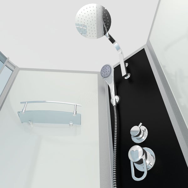 Moderne Dusche mit runder Regendusche, Handbrause, Armaturen und einer Glasablage an der Wand.