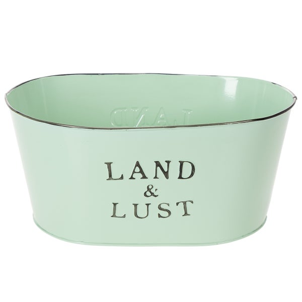 Ovaler Pflanztopf aus Metall in Mintgrün mit der Aufschrift Land und Lust.