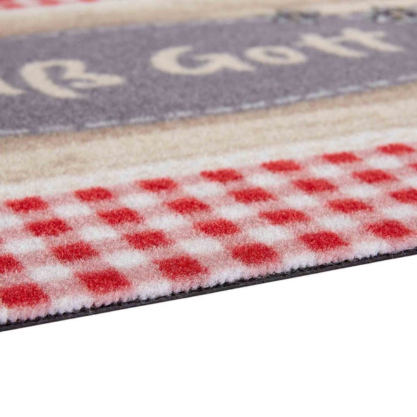 Fußmatte mit kariertem Muster und Schriftzug