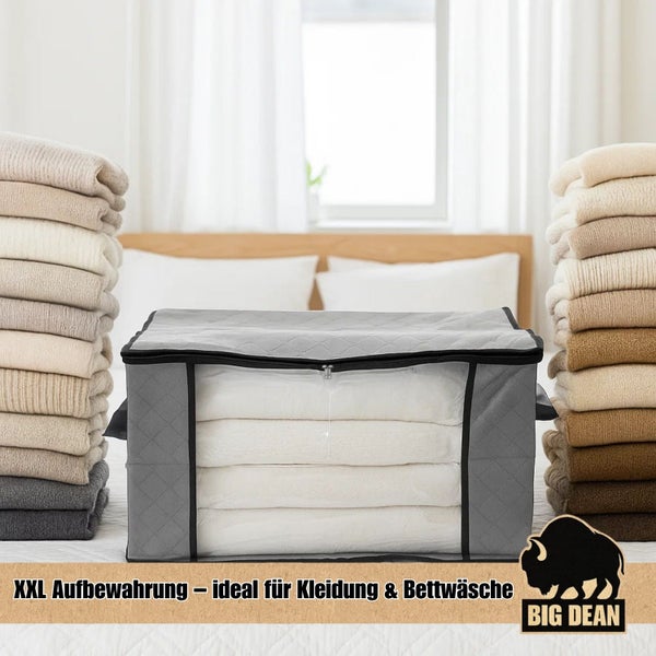Big Dean Aufbewahrungstasche XXL mit Reißverschluss und Sichtfenster für Kleidung und Bettwäsche auf einem Bett.