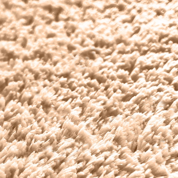 Nahaufnahme eines Teppichs mit hochfloriger Textur