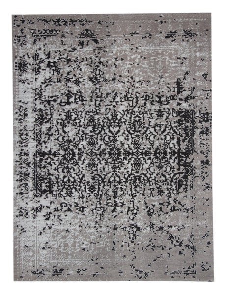 Nahaufnahme eines gewebten Teppichs mit abstraktem Vintage-Muster in Grau und Schwarz.