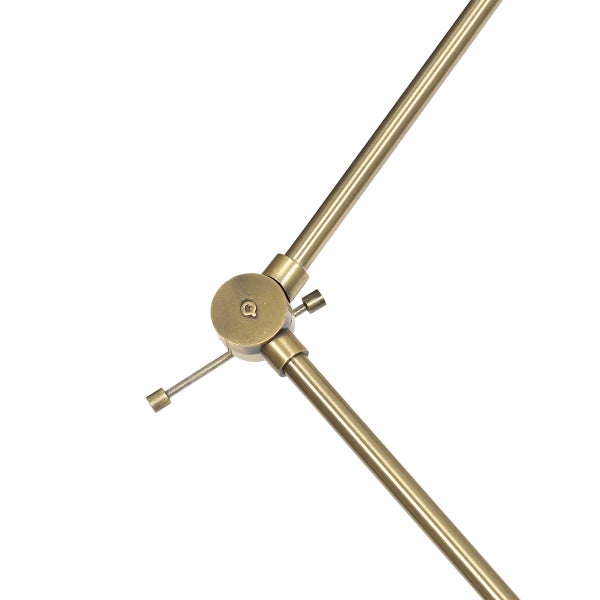 Detail einer goldenen Gelenkverbindung für eine Leuchte