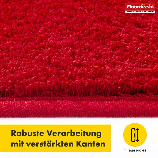 Nahaufnahme eines roten Teppichs mit verstärkten Kanten und einer Höhe von 14 Millimetern.