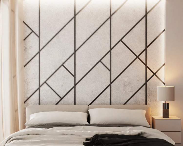 Schlafzimmer mit geometrischer Wandgestaltung und Nachttischlampe