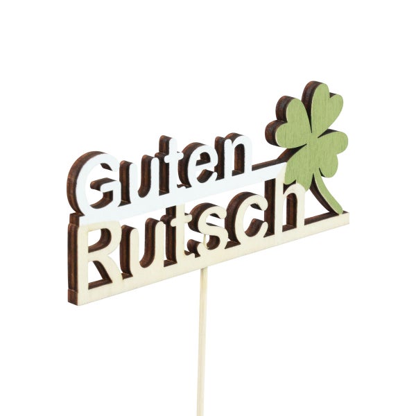 Dekorationselement mit der Aufschrift Guten Rutsch und einem vierblättrigen Kleeblatt.