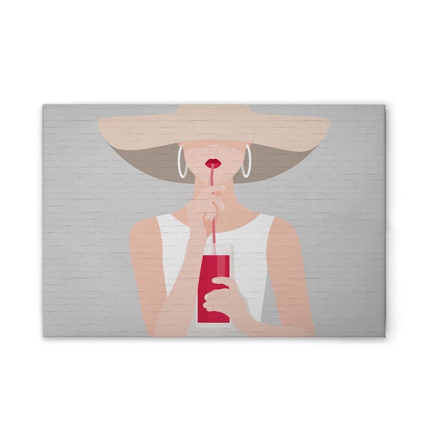 Dekorative Leinwand mit Frau mit Hut und Getränk vor einer Backsteinmauer