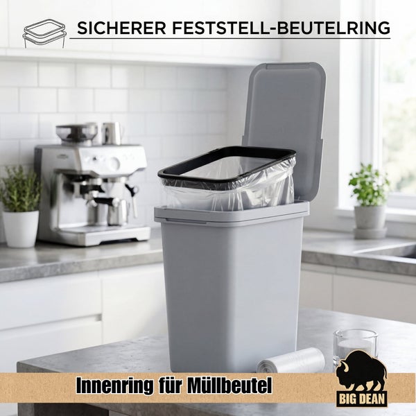 Küchenabfalleimer mit Deckel und Beutelring zur Befestigung von Müllbeuteln auf einer Küchenarbeitsplatte vor einer Kaffeemaschine.